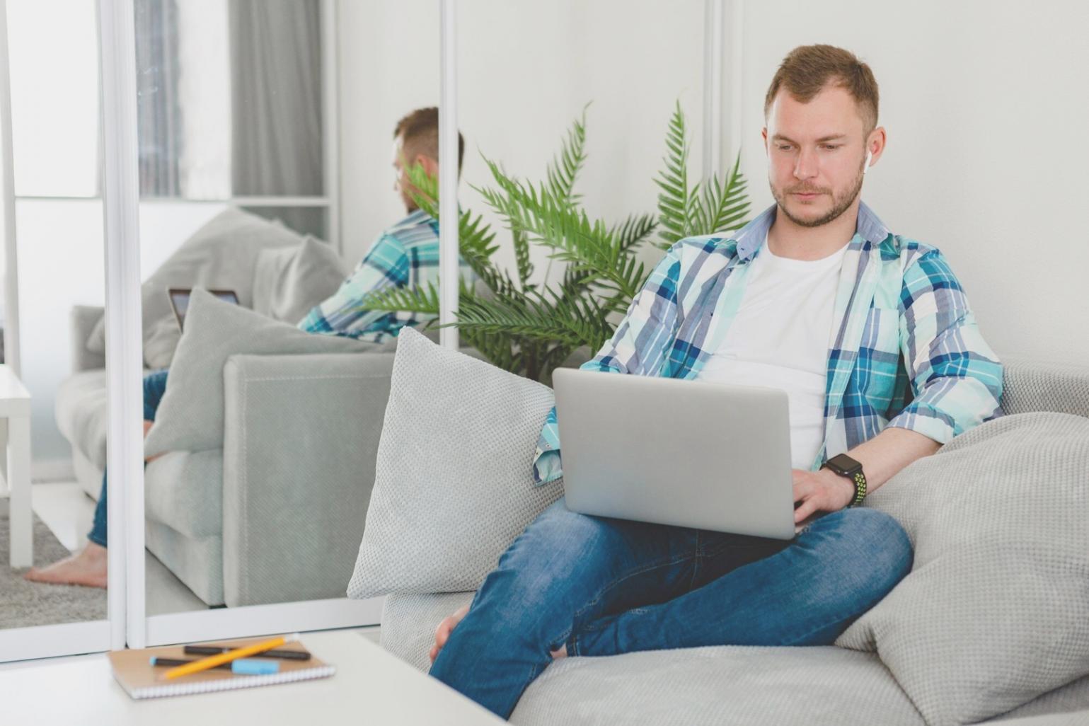 Financial analyst reviewing company reports and charts